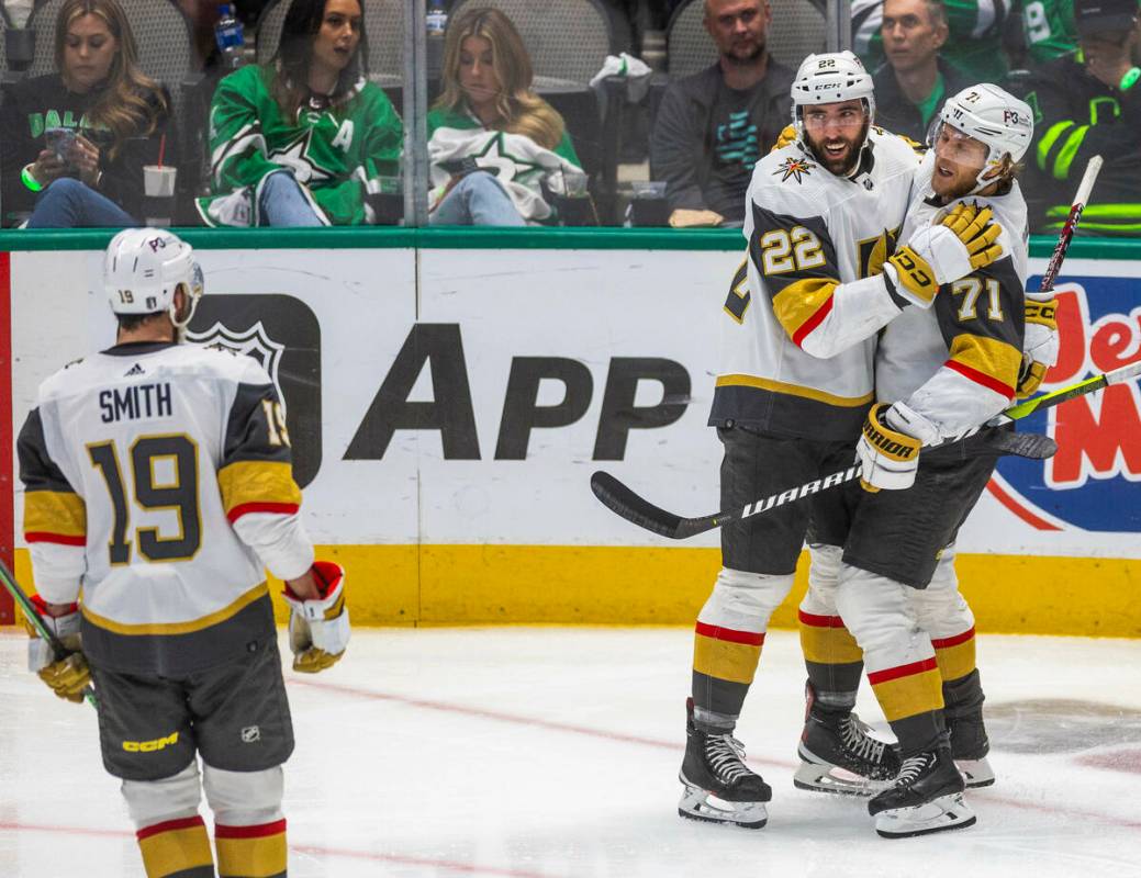 Golden Knights center William Karlsson (71) and right wing Michael Amadio (22) celebrate a scor ...