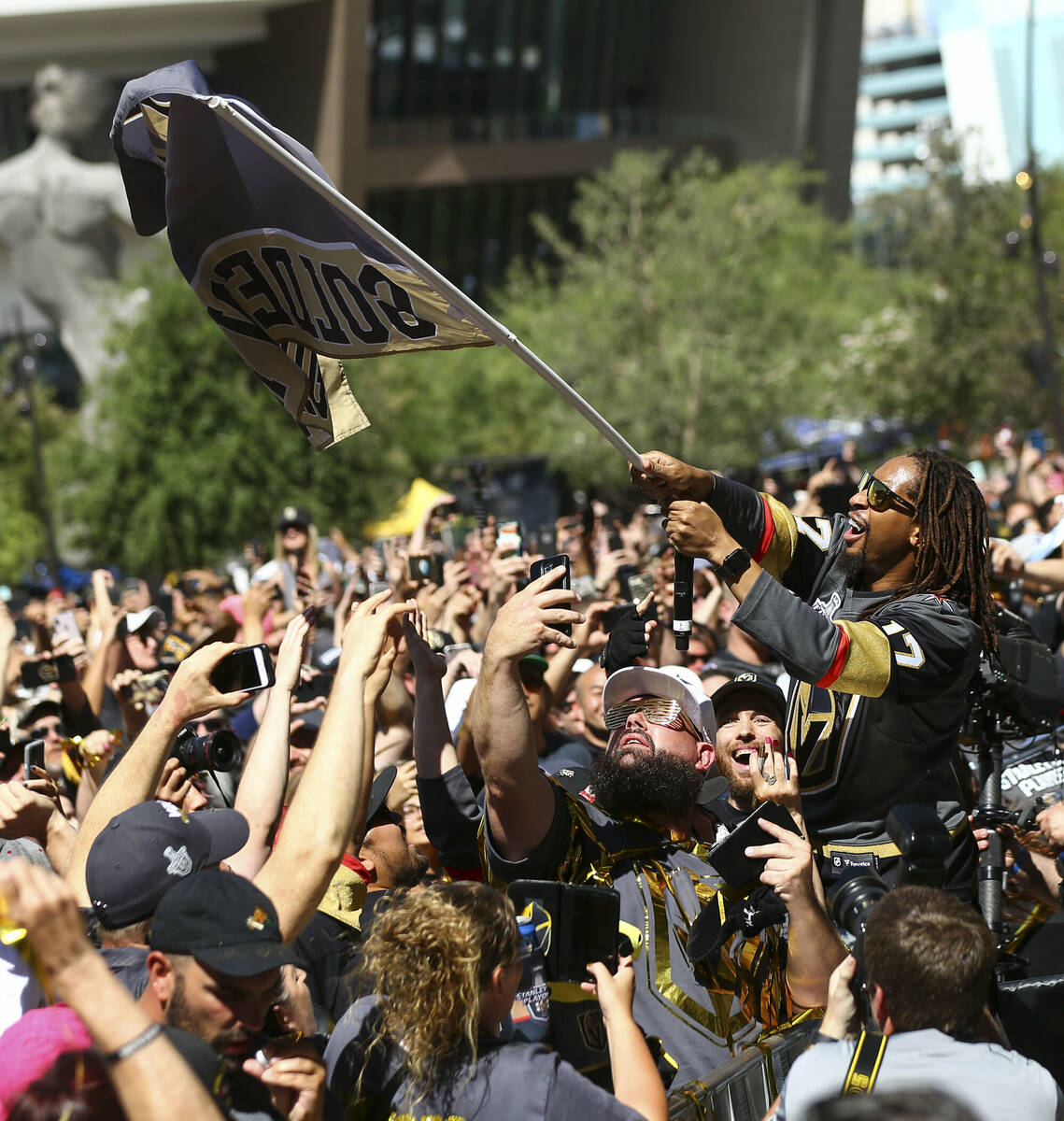 Lil Jon waves a Golden Knights flag during a concert ahead of Game 1 of the NHL hockey Stanley ...