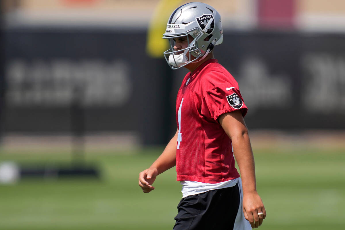 Raiders quarterback Aidan O'Connell takes part in the NFL football team's organized team activi ...