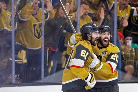 Golden Knights right wing Mark Stone (61) and center Chandler Stephenson (20) celebrate Stone&# ...