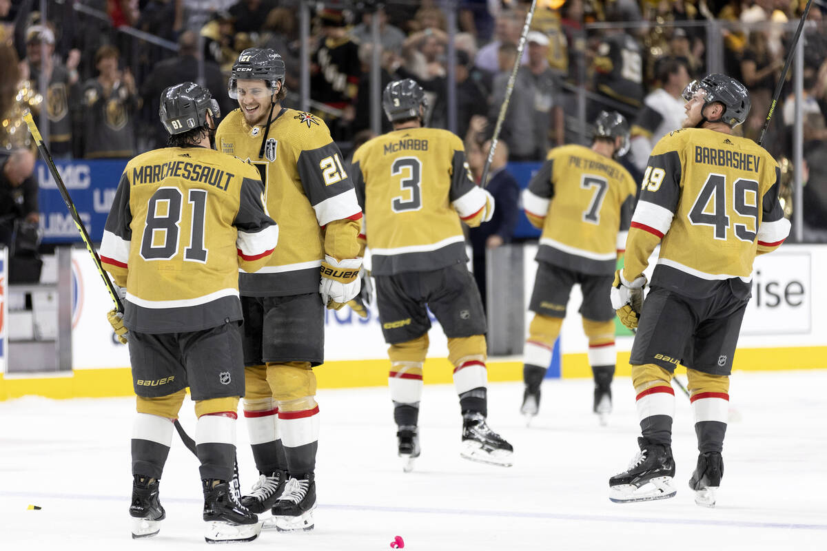 Golden Knights right wing Jonathan Marchessault (81) and center Brett Howden (21) celebrate aft ...