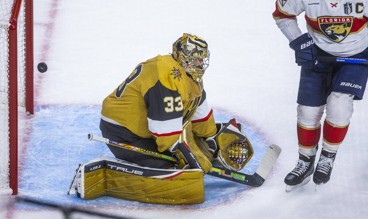 Golden Knights goaltender Adin Hill (33) misses a goal shot by the Florida Panthers during the ...