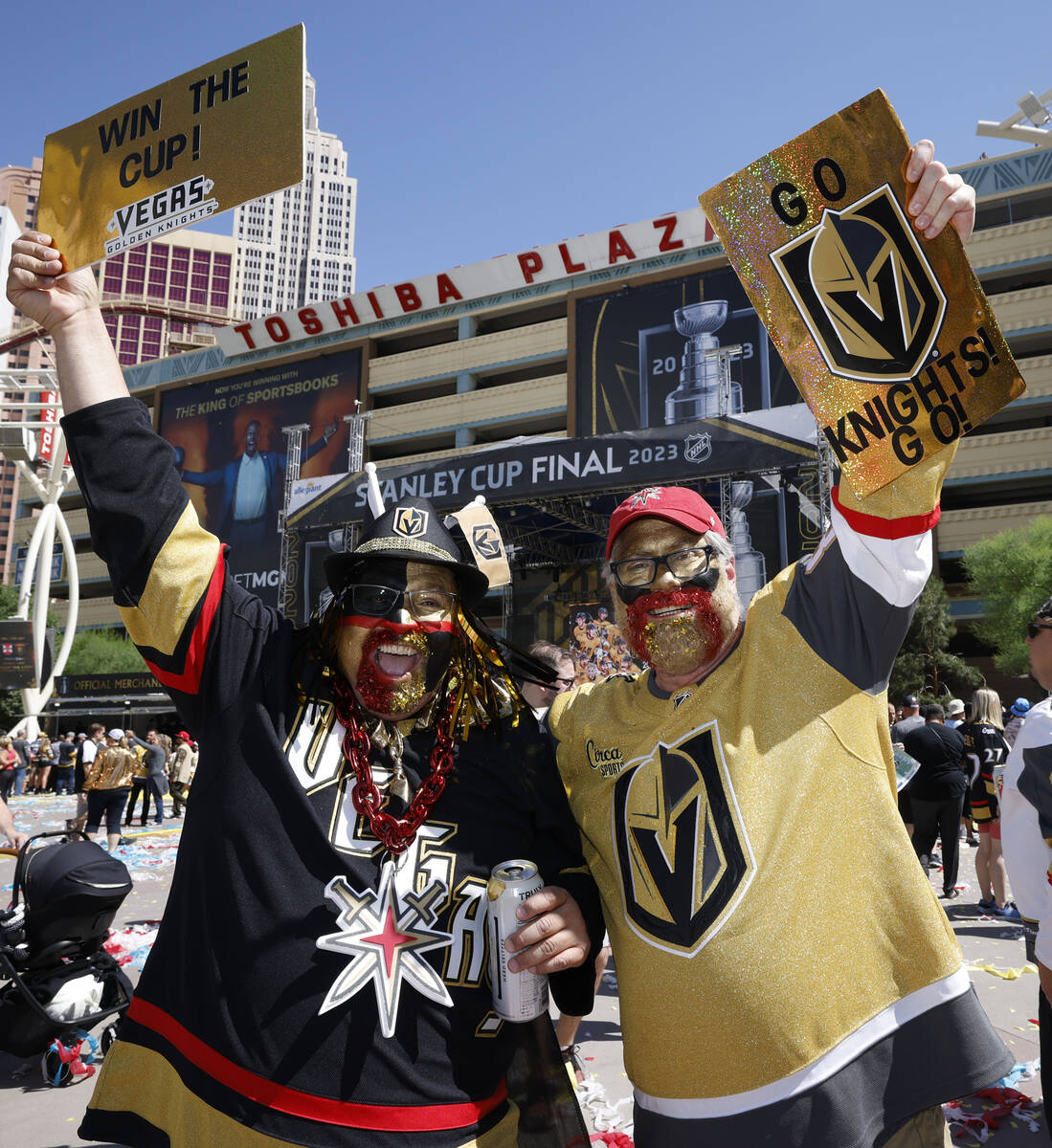Golden Knights fans Albert Ronquillo, left, and Matt Schafer, right, both from Las Vegas, pose ...
