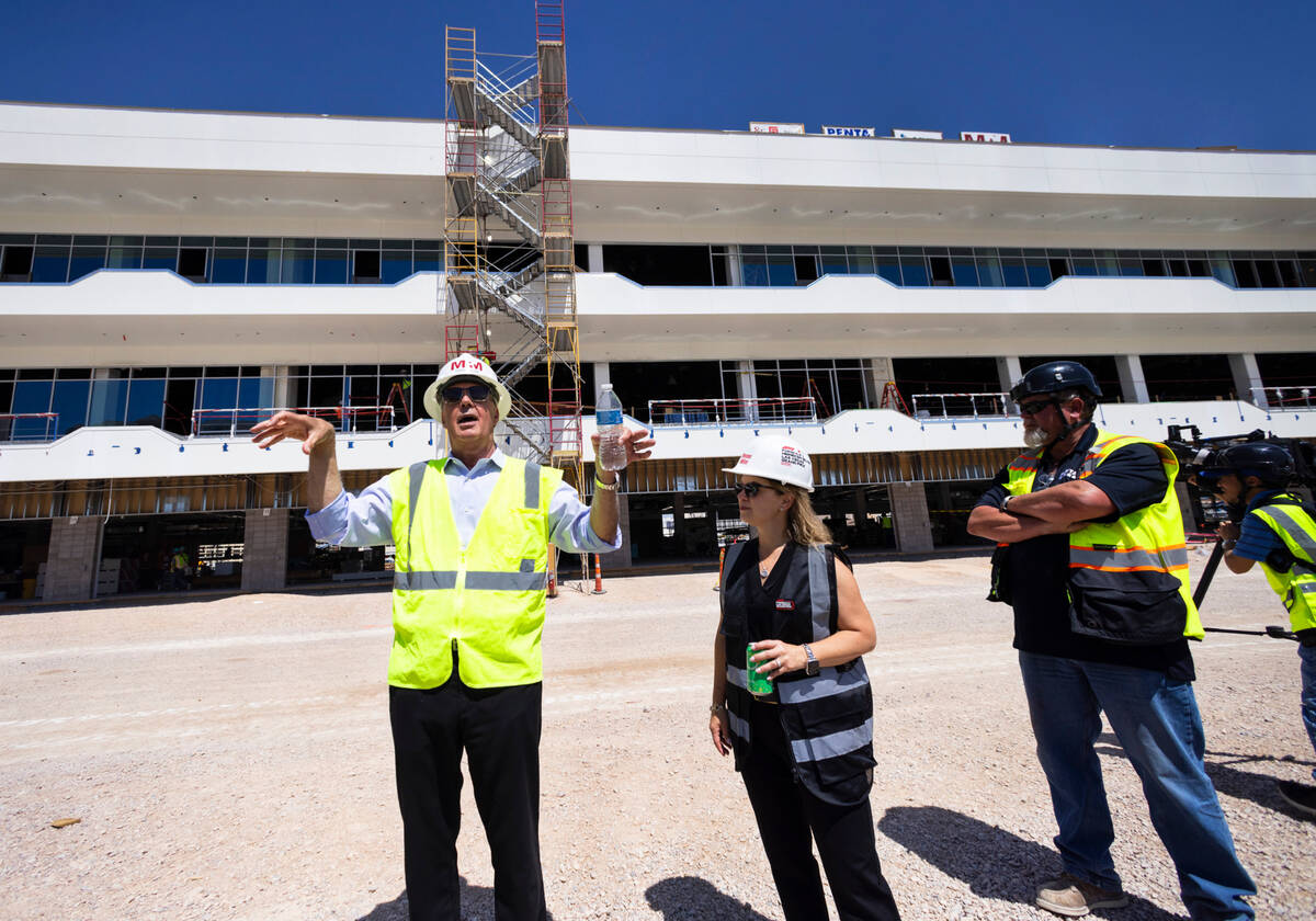Terry Miller of Miller Project Management and Las Vegas Grand Prix, Inc. CEO Renee Wilm, center ...