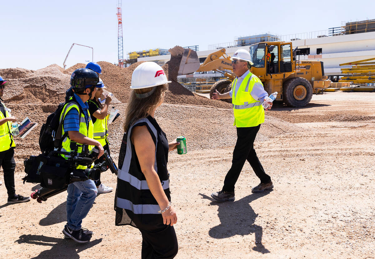 Terry Miller of Miller Project Management and Las Vegas Grand Prix, Inc. CEO Renee Wilm, center ...