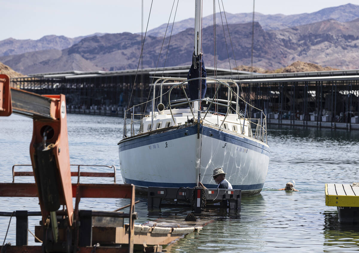 People prepare to take their boat out of the water at the Las Vegas Boat Harbor in the Lake Mea ...