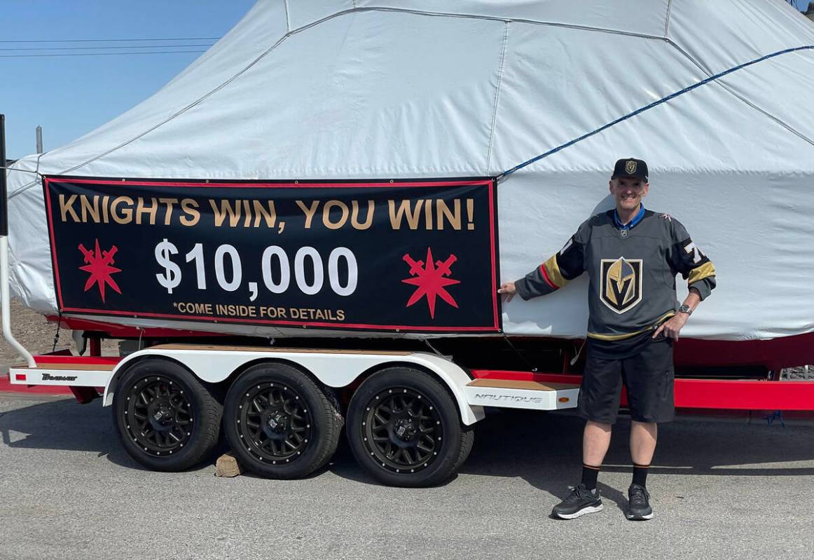 Boat retailer Dan Boyle with one of five boats at Proshop Motorsports and Marine in Henderson t ...