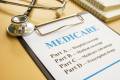 What are husband’s Medicare options after wife’s job loss?