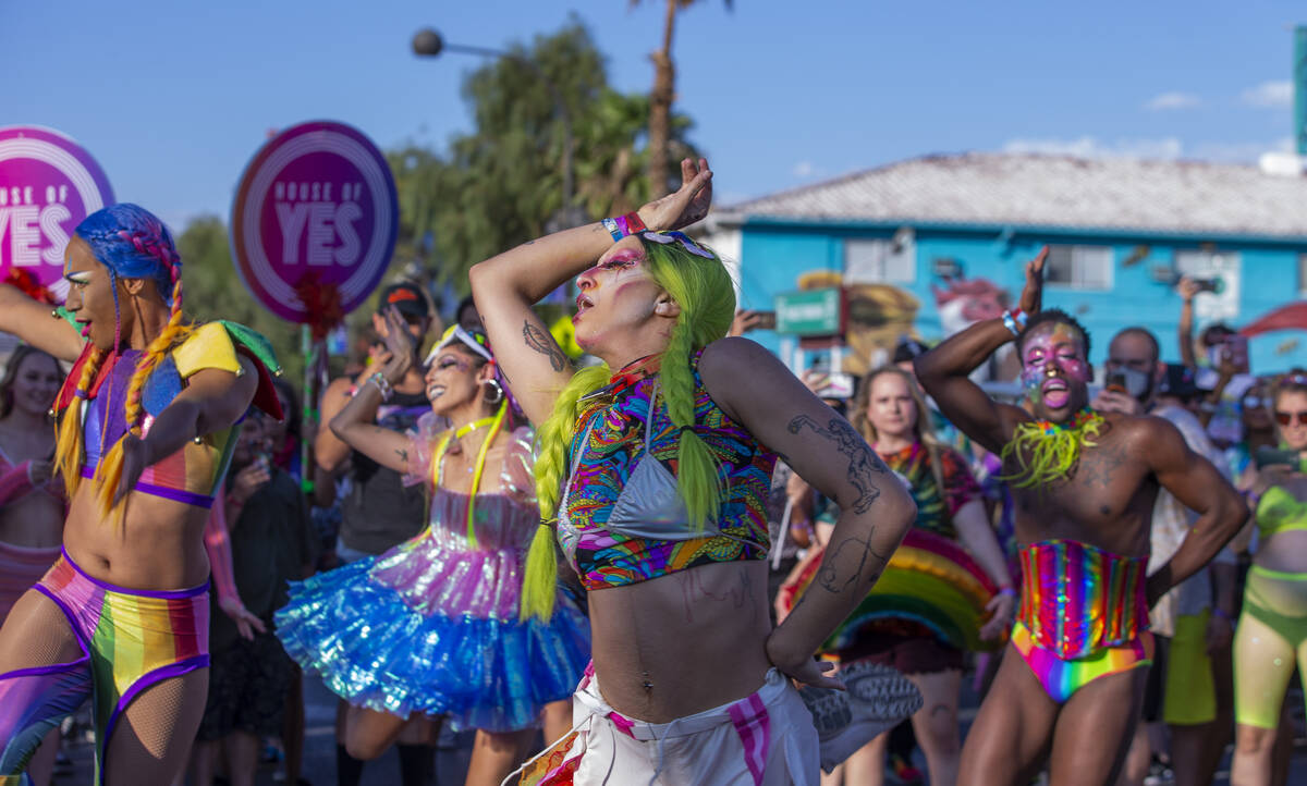 Dancers with The House of Yes perform during a Gay Pride parade on Fremont Street during day tw ...