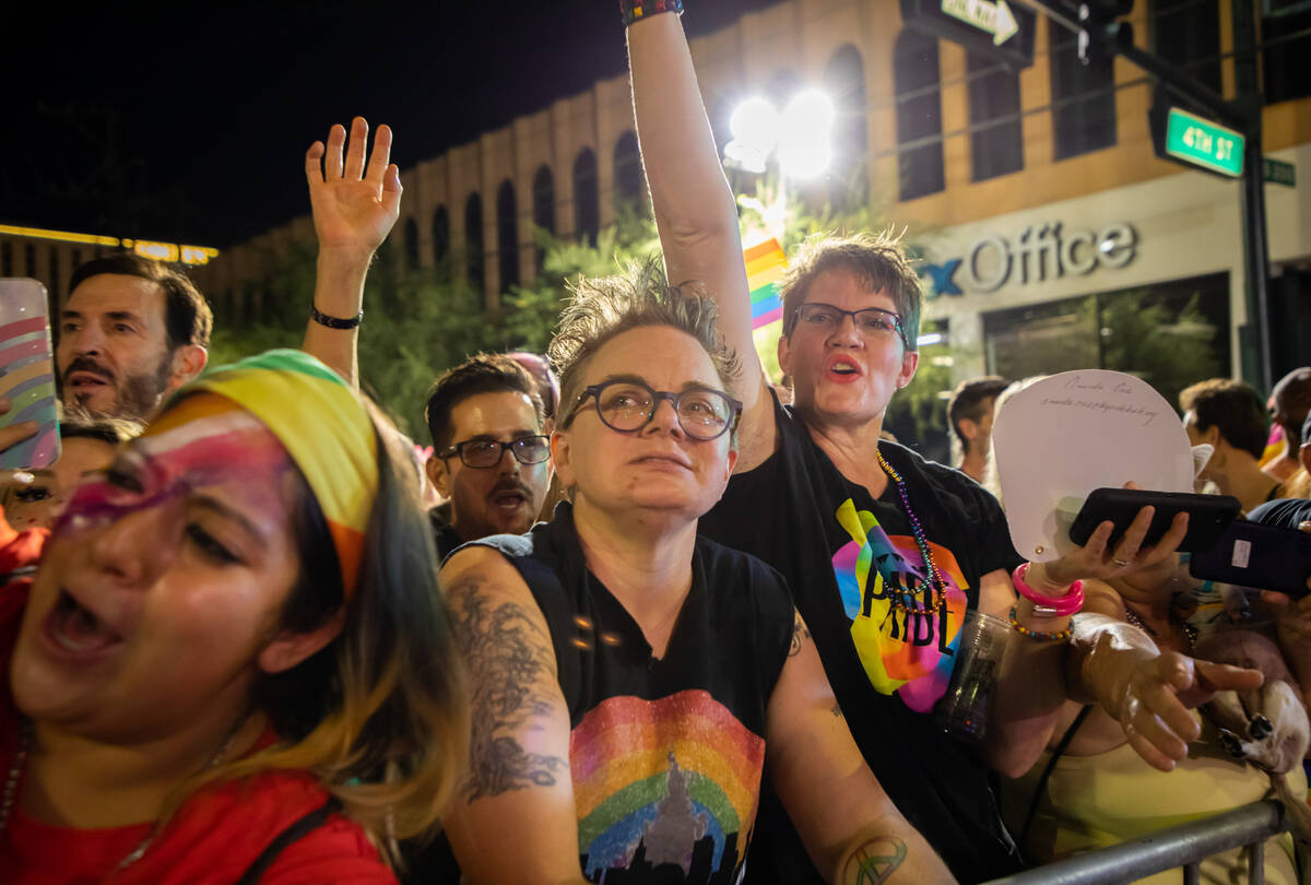 People watch the annual downtown Pride parade on Friday, Oct. 7, 2022, in Las Vegas. (Amaya Edw ...