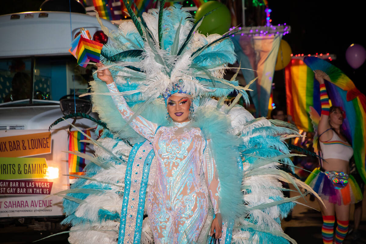 A member of the Phoenix Bar float in the annual downtown Pride parade on Friday, Oct. 7, 2022, ...