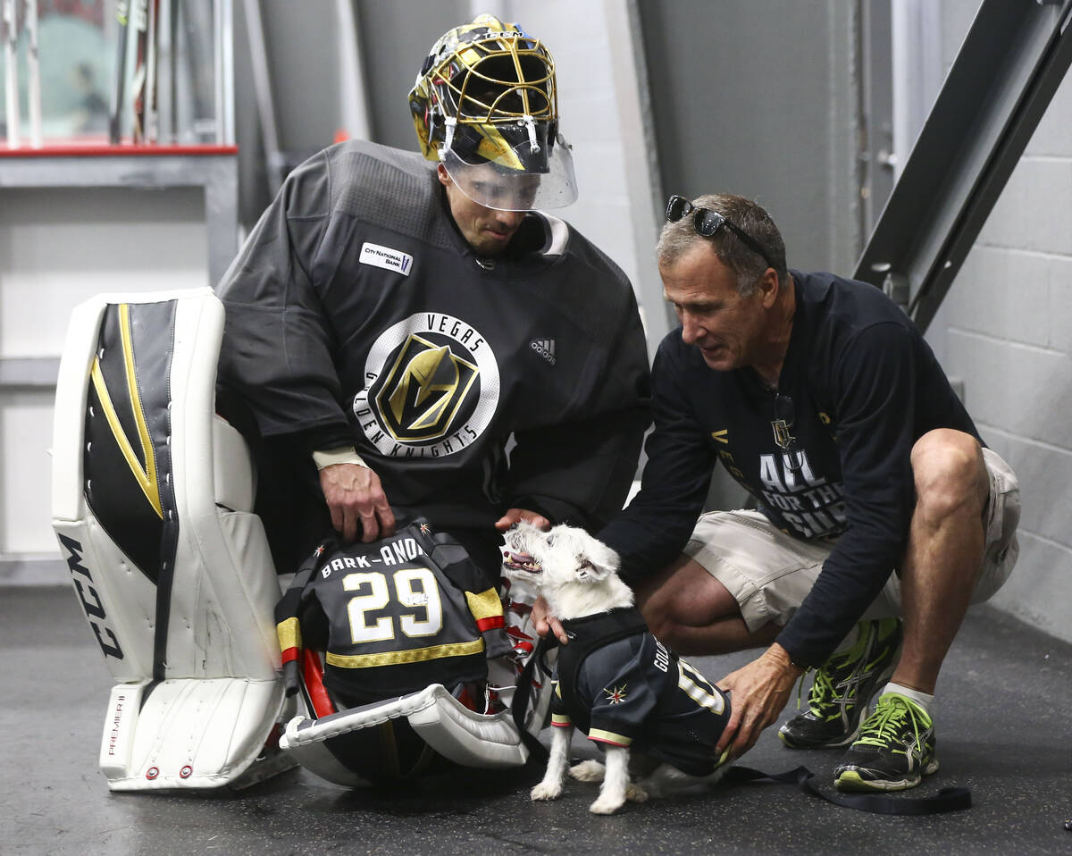 Golden Knights goaltender Marc-Andre Fleury (29) meets Bark Andre-Furry, a Jack Russell terrier ...