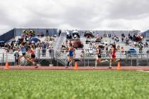 Runners compete in the girls 400 meter dash during the class 5A Southern Region boys and girls ...