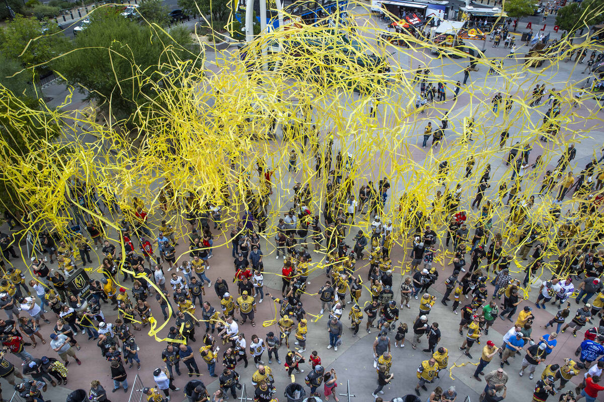 Streamers come down on fans waiting to enter the arena in Toshiba Plaza before Game 2 of the NH ...