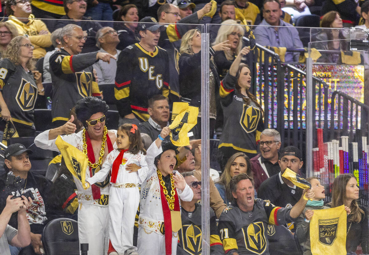 Golden Knights fans celebrate a goal past Florida Panthers goaltender Sergei Bobrovsky (72) in ...