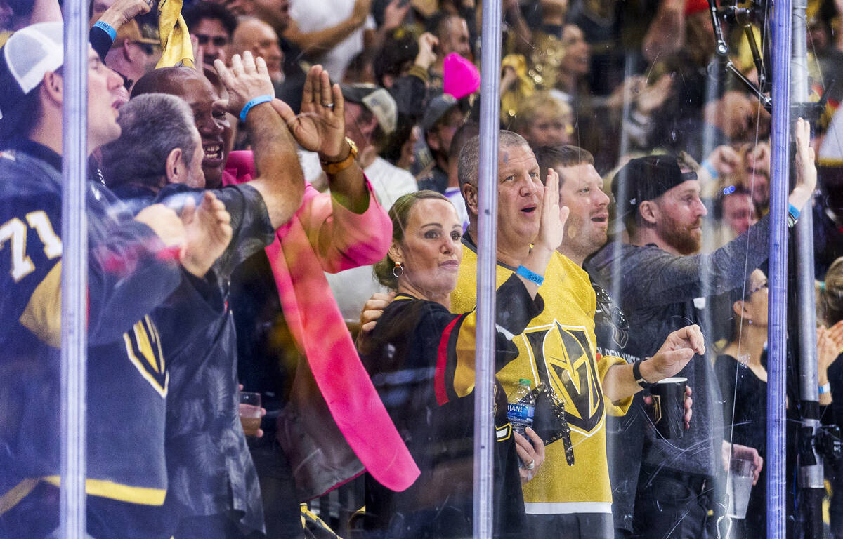 Golden Knights fans including Derek Stevens and his wife celebrate another goal against the Flo ...