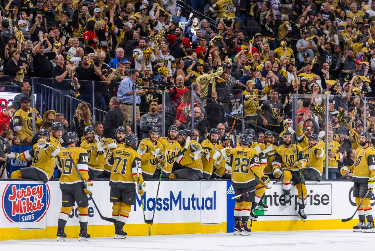 Golden Knights players celebrate another goal against the Florida Panthers in the third period ...