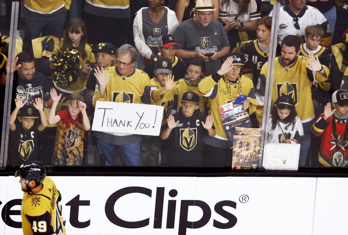 People cheer as Golden Knights center Ivan Barbashev (49) warms up before Game 2 of the NHL hoc ...