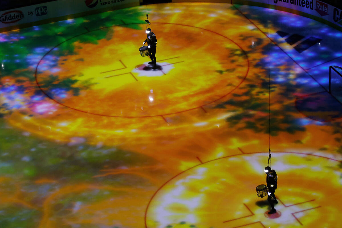 Members of Vegas Golden Knights Knight Line by Drumbots perform during the pre-game show before ...