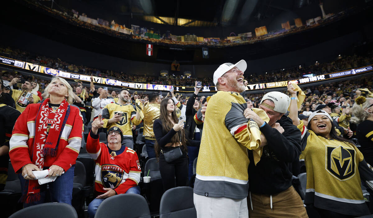 Golden Knights fans celebrate during Game 2 of the NHL hockey Stanley Cup Final at T-Mobile Are ...