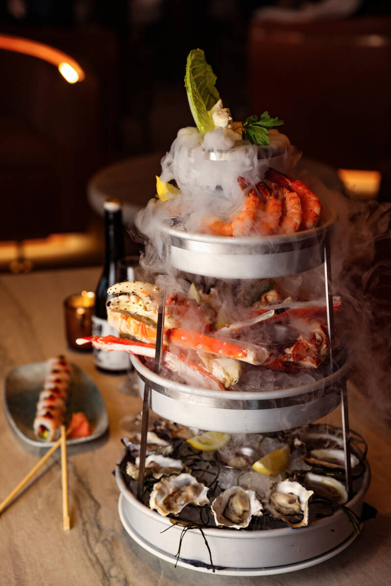 The Smoking Shellfish Tower, a custom built tower of mixed seafood, at Ocean Prime, an upscale ...