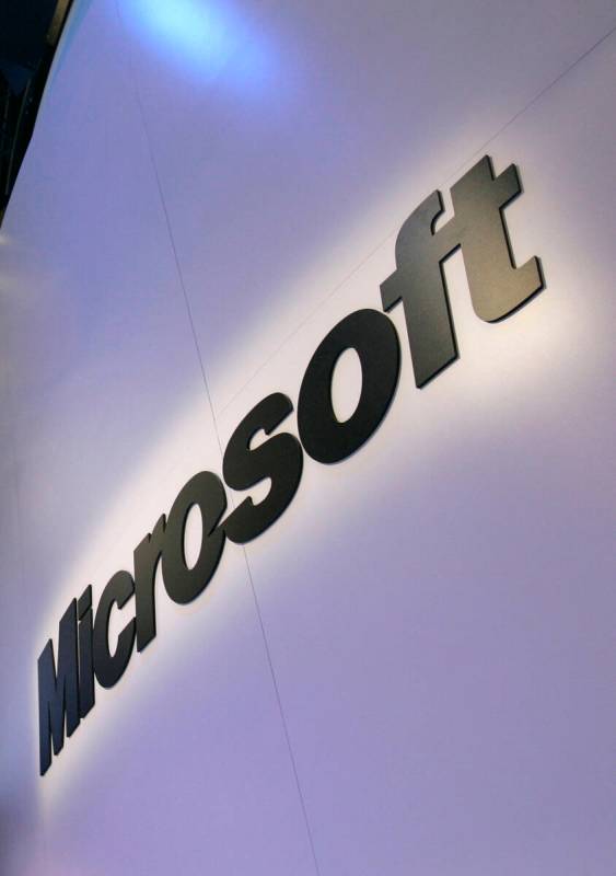 FILE - In this Jan. 10, 2009 file photo, the Microsoft logo is seen in Las Vegas. Thousands of ...