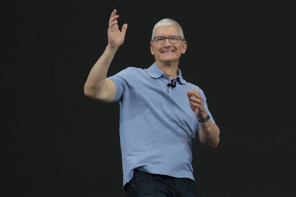 Apple CEO Tim Cook speaks during an annoucement of new products on the Apple campus Monday, Jun ...