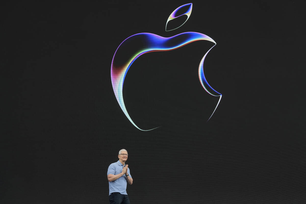 Apple CEO Tim Cook speaks during an annoucement of new products on the Apple campus Monday, Jun ...