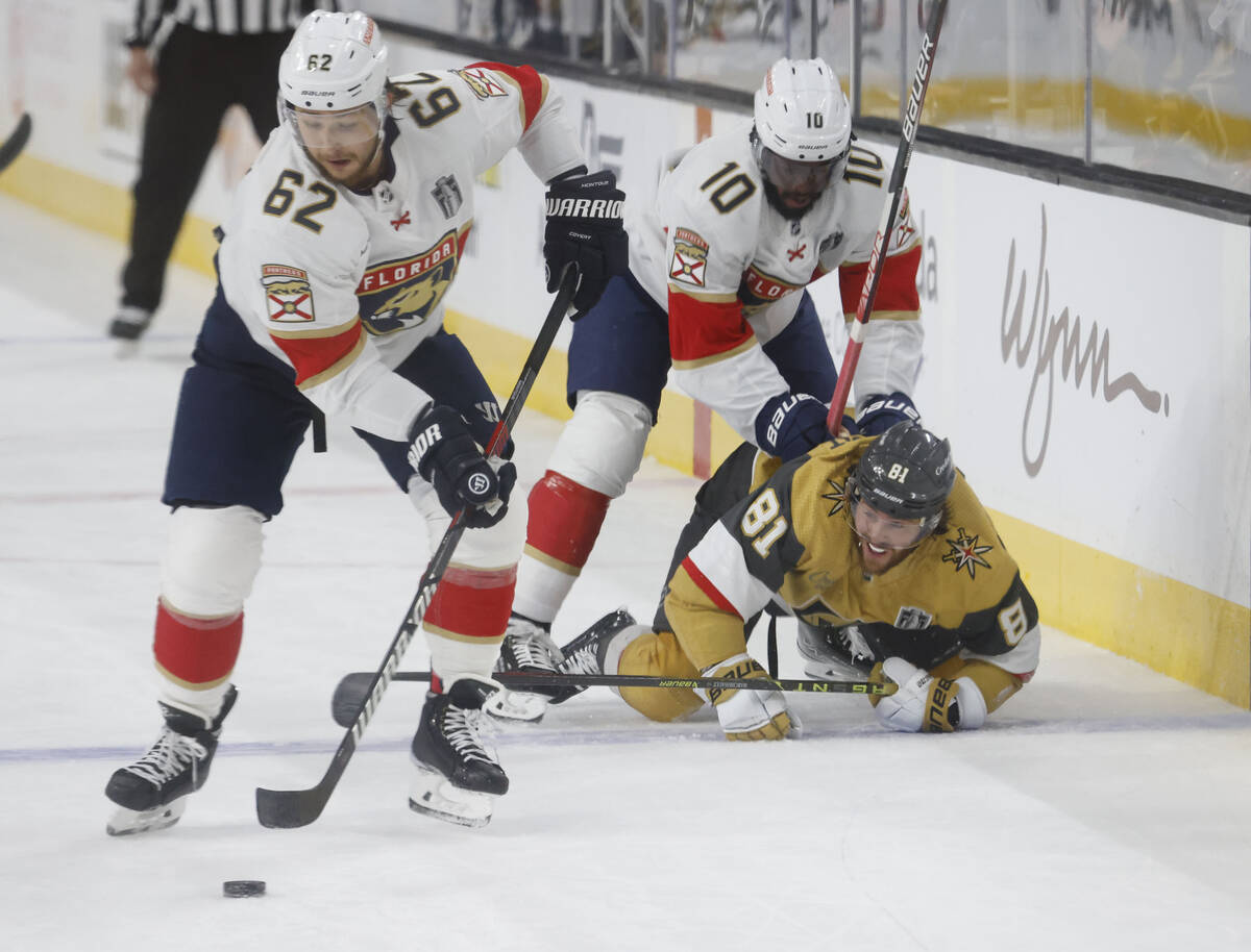 Golden Knights right wing Jonathan Marchessault (81) is dropped to the ice as he competes again ...