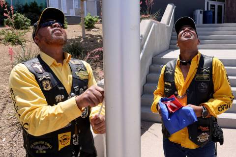 Will Witt, left, and Dave McKinney with Buffalo Soldiers Motorcycle Club Las Vegas Post prepare ...