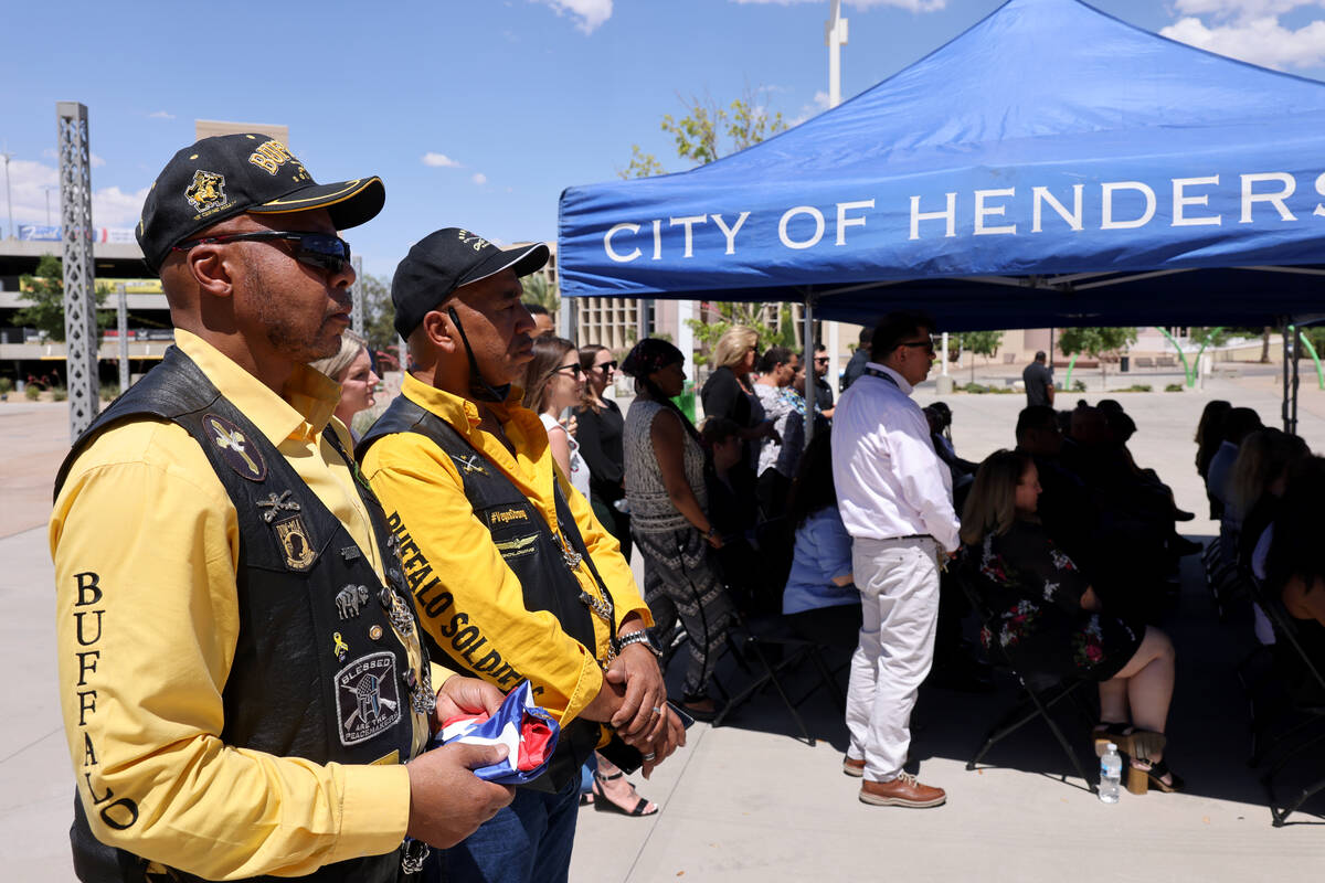 Will Witt, left, and Dave McKinney with Buffalo Soldiers Motorcycle Club Las Vegas Post stand w ...
