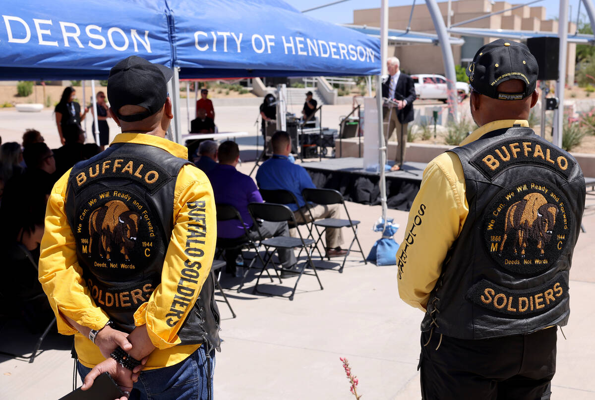 Dave McKinney, left, and Will Witt with Buffalo Soldiers Motorcycle Club Las Vegas Post wait to ...