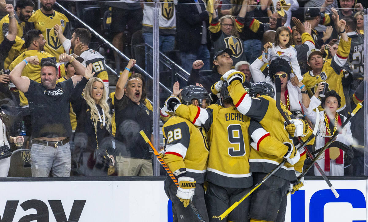 Golden Knights players and fans celebrate another goal against the Florida Panthers in the thir ...