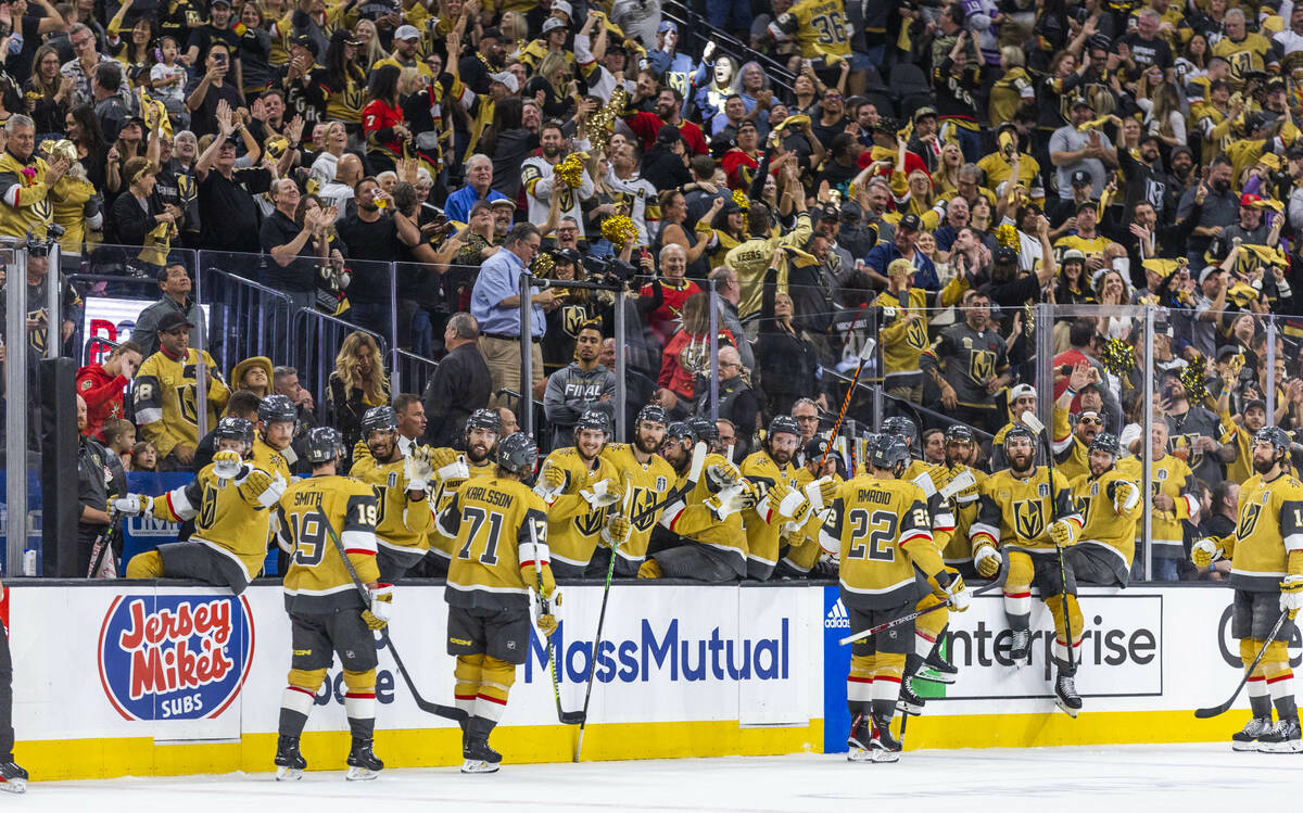 Golden Knights players celebrate another goal against the Florida Panthers in the third period ...