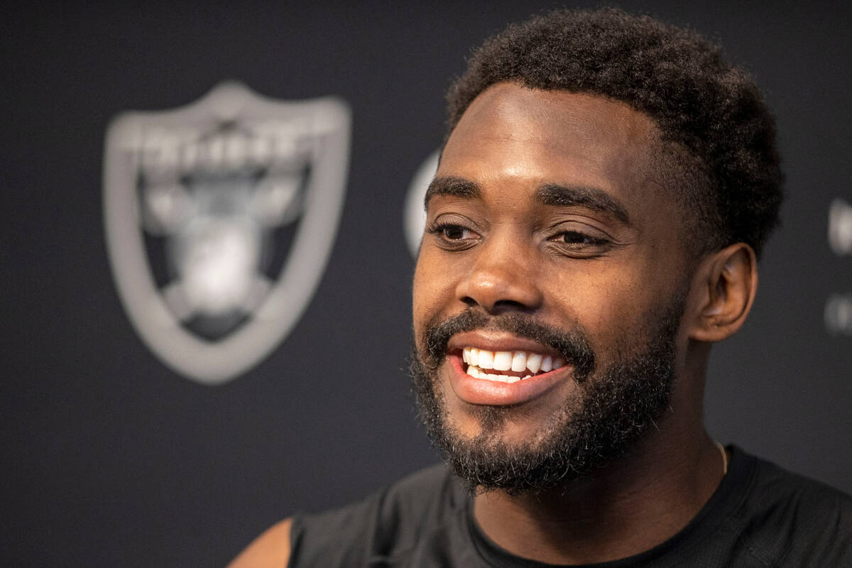 Raiders linebacker Divine Deablo smiles at a news conference during the team’s mandatory ...