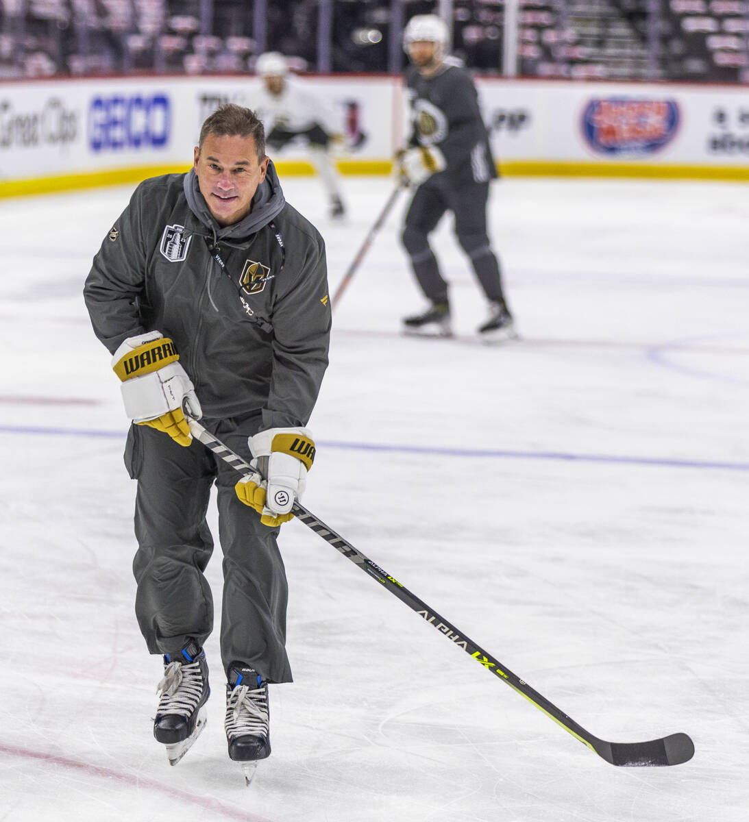 Golden Knights head coach Bruce Cassidy looks to his players during an early skate before Game ...