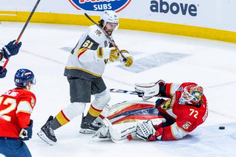 Golden Knights right wing Mark Stone (61) celebrates a score on Florida Panthers goaltender Ser ...