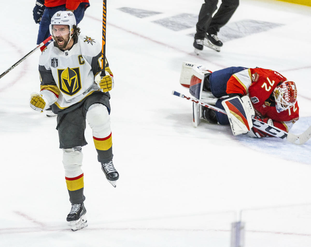 Golden Knights right wing Mark Stone (61) celebrates a score on Florida Panthers goaltender Ser ...