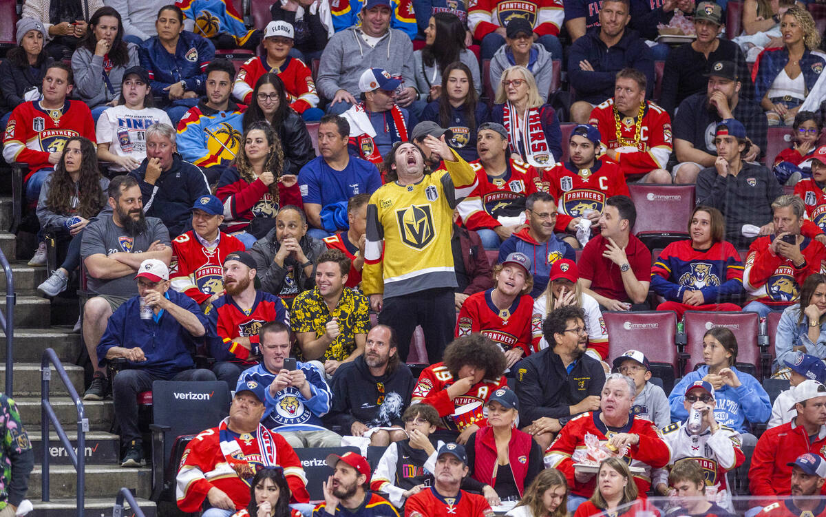 Golden Knights fans celebrate a score against the Florida Panthers in the second period during ...