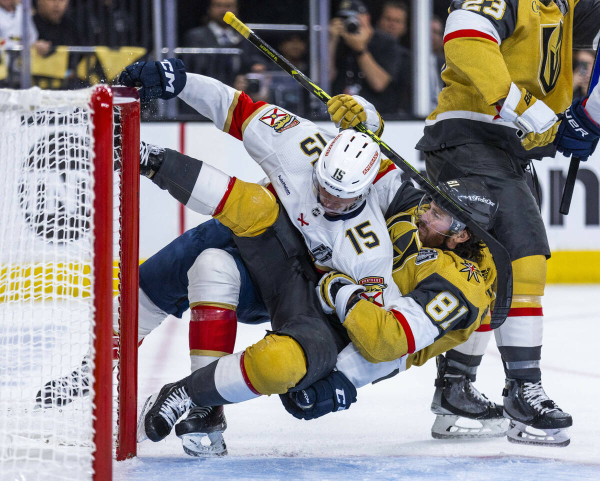Florida Panthers center Anton Lundell (15) is taken down during a fight with Golden Knights rig ...