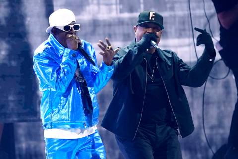 Flavor Flav, left, and Chuck D. perform "Rebel Without a Pause" at the 65th annual Gr ...