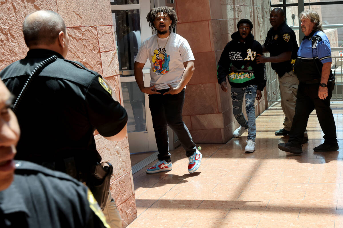Marshals keep the family of victim Charles Vailes Jr. from the family of defendant Jcahoyl Duck ...
