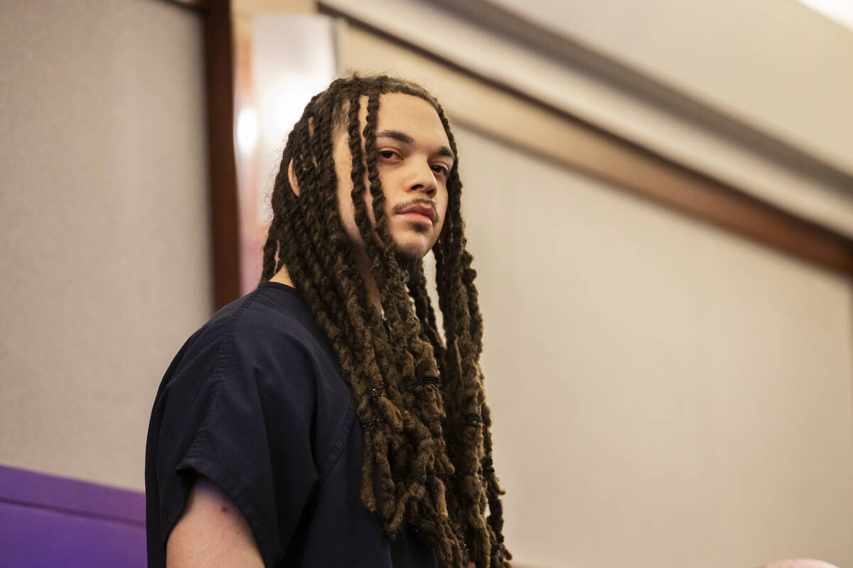 Jcahoyl Ducksworth, who was charged with second degree murder of Charles Vailes Jr., stands for ...