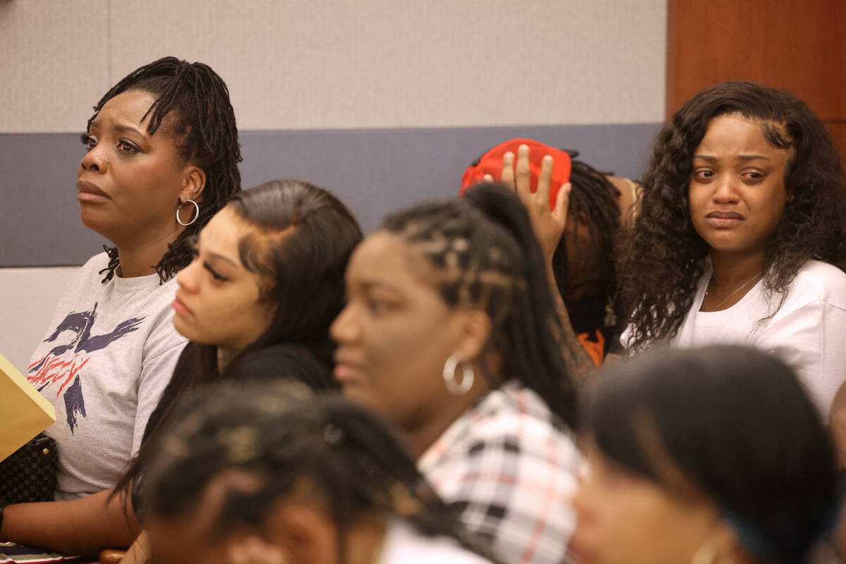 Family members of murder victim Charles Vailes Jr., react during a sentencing hearing for Jcaho ...