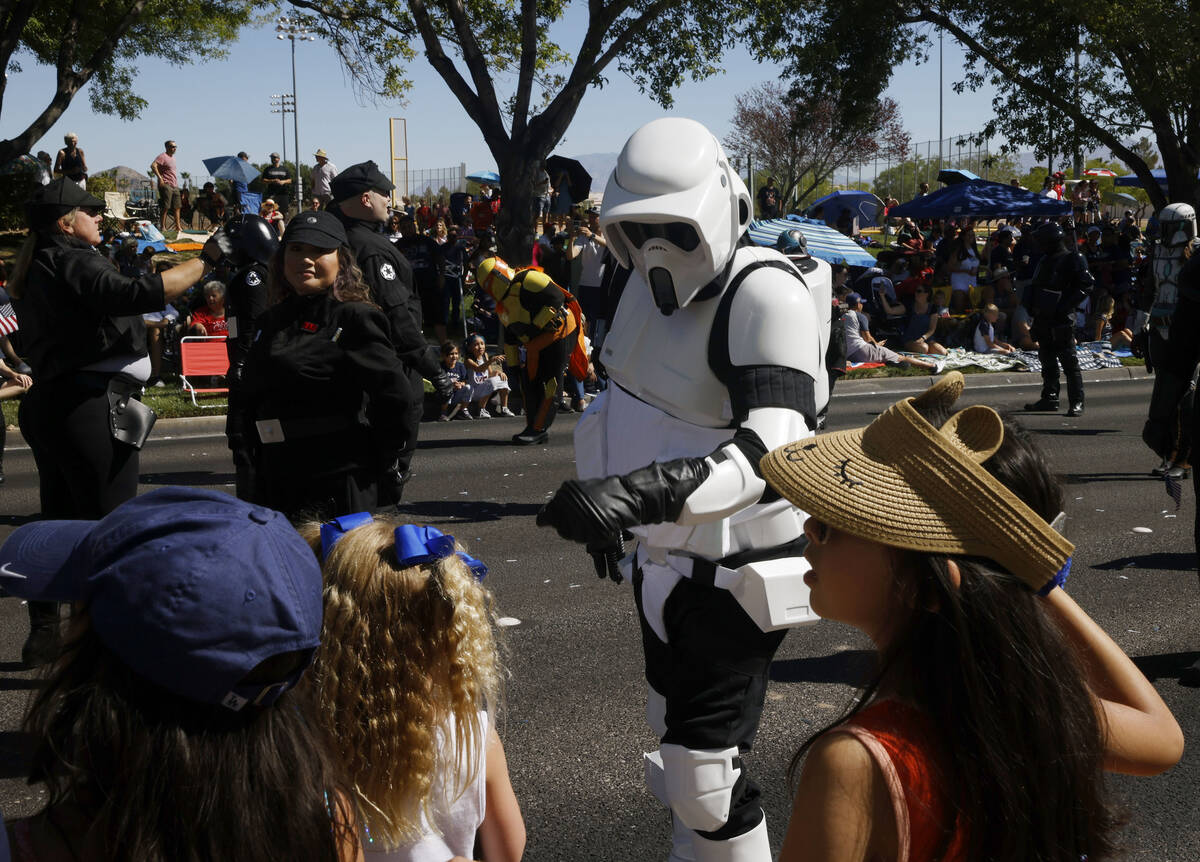 A Star Wars character greets people during the 28th annual Summerlin Council Patriotic Parade, ...