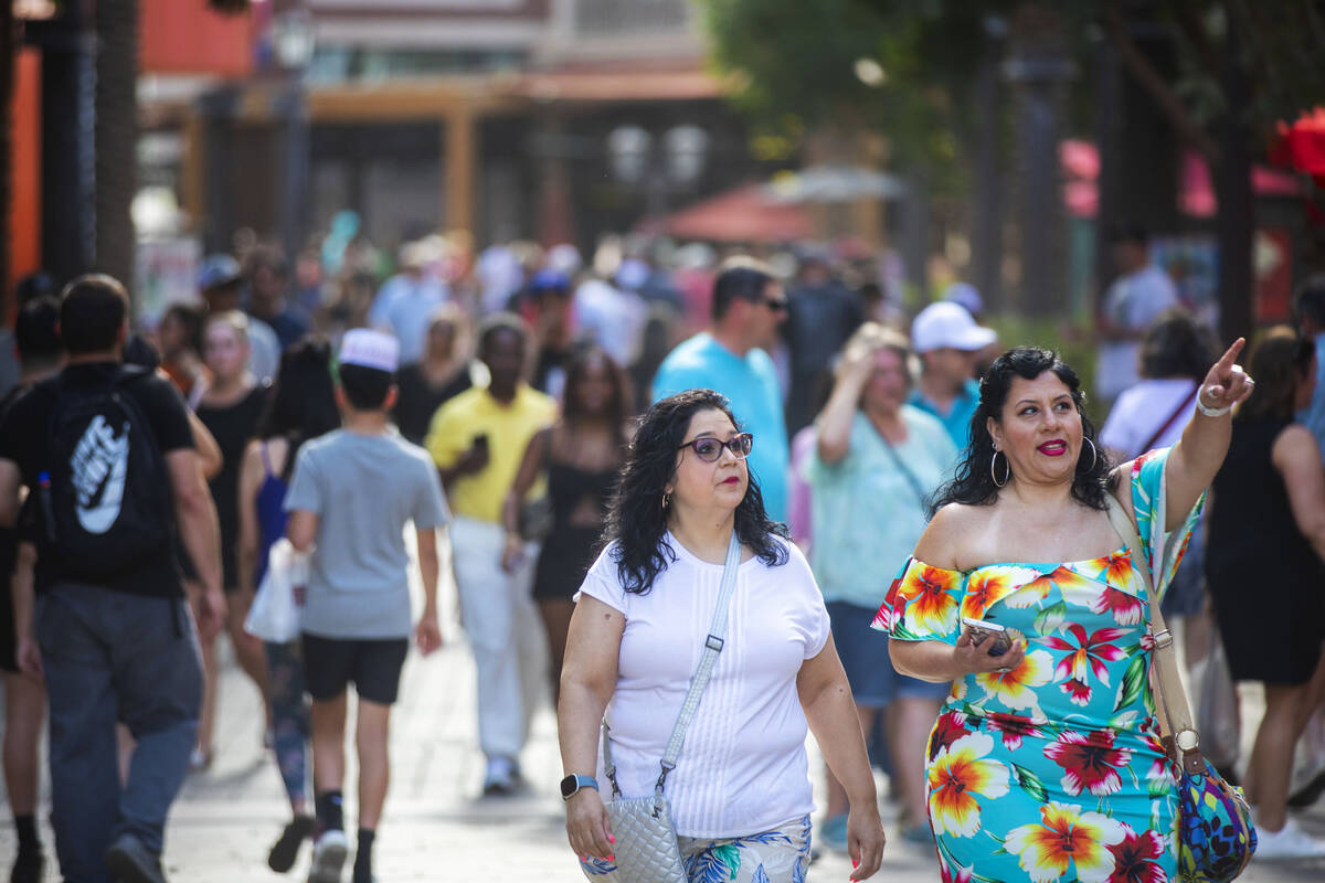 Tourists walk through the strip on Friday, June 2, 2023, in Las Vegas. (Daniel Pearson/Las Vega ...