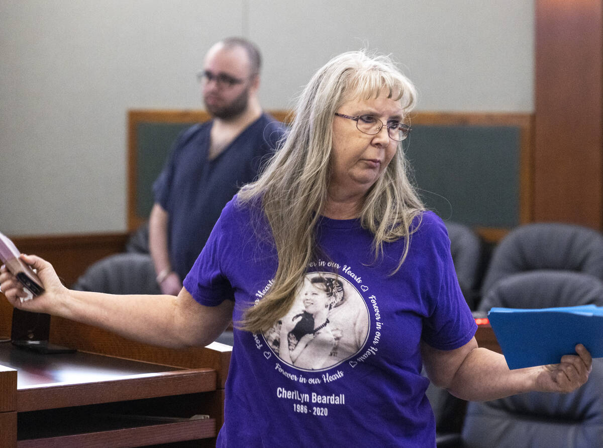 Susanne Beardall, the mother of murder victim Cherllyn Beardall, wearing a shirt displaying her ...