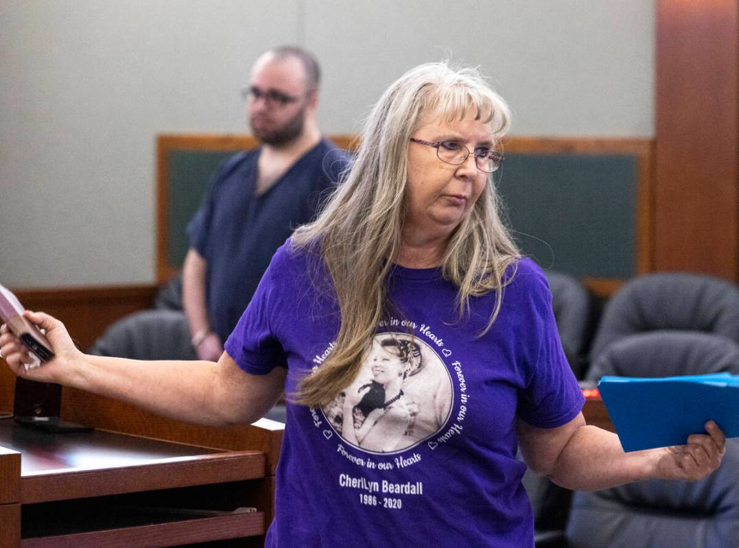 Susanne Beardall, the mother of murder victim Cherllyn Beardall, wearing a shirt displaying her ...