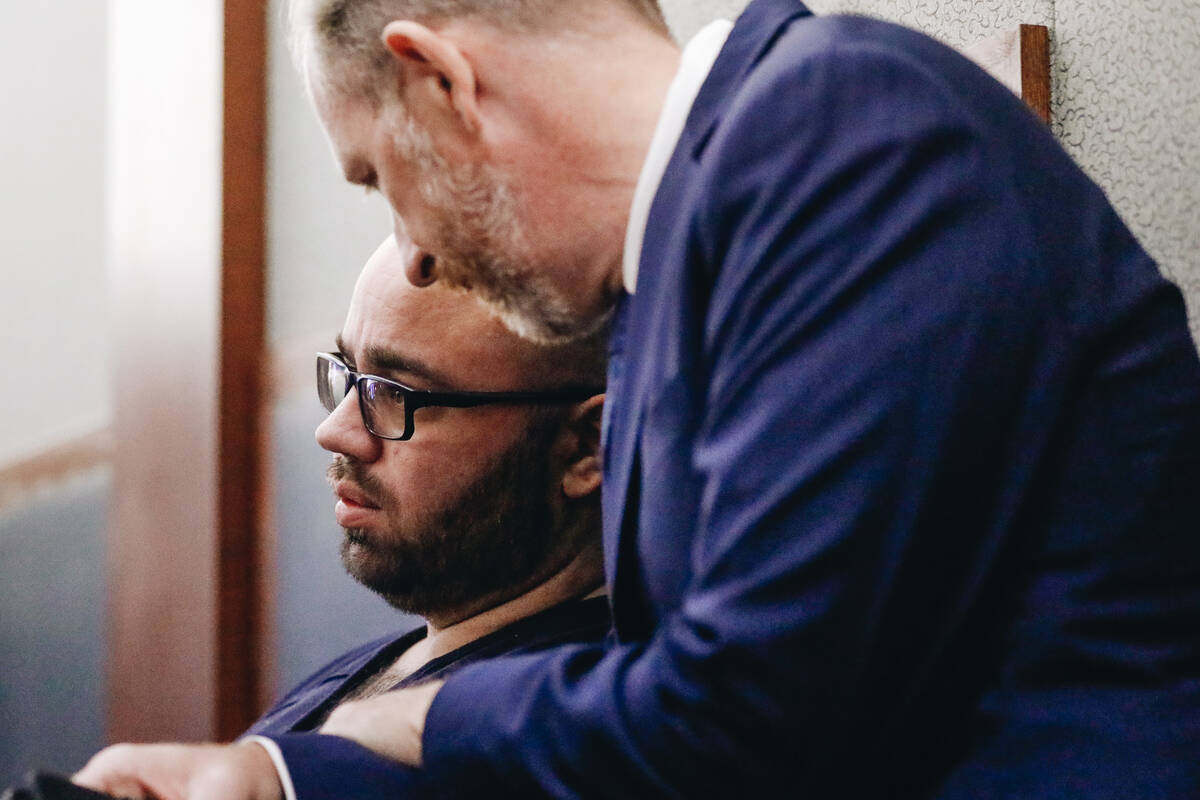 Chief Deputy Public defender David Westbrook, right, preps Philip O’Reilly before his sentenc ...