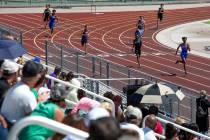 Bishop Gorman's Maleik Pabon leads the pack in the boys 400 meter race during the class 5A Sout ...
